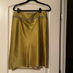 Gorgeous chartreuse silk skirt with rhinestone inlay around the lower waist.